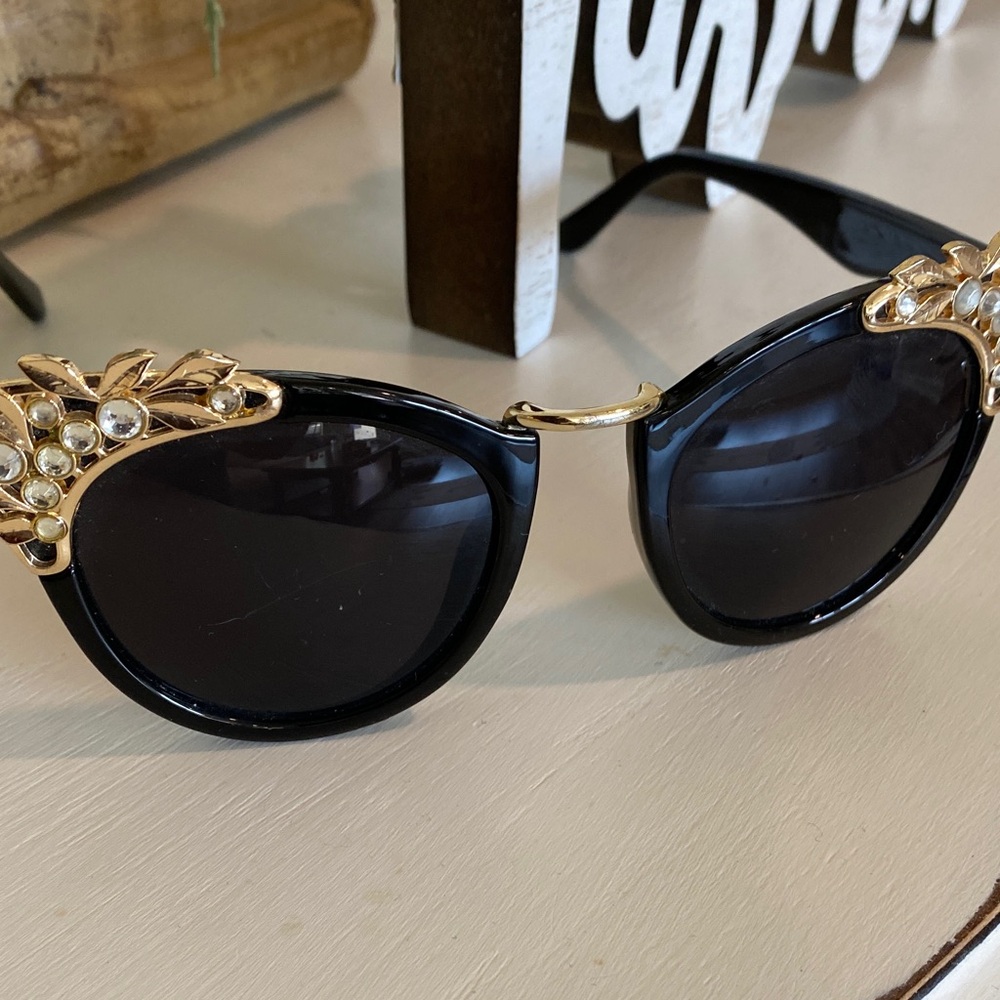 Elegant Black and Gold Sunglasses
